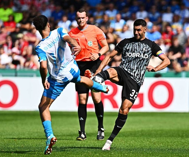 SC-Kreativkraft Vincenzo Grifo (rechts...gegen seinen Ex-Verein TSG Hoffenheim.  | Foto: Achim Keller