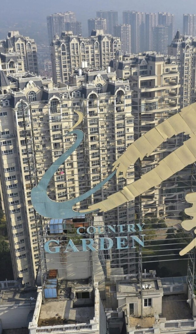 Auch Country Garden ist ein Immobilien...ternehmens  in der Stadt in Zhenjiang.  | Foto: STR (AFP)