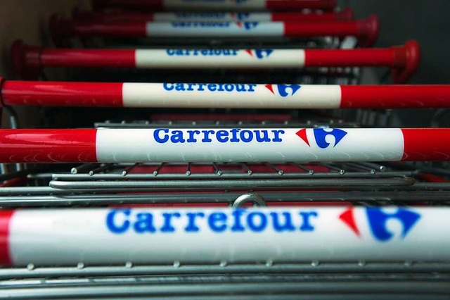 Carrefour will versteckte Preiserhhungen sichtbar machen.  | Foto: Ahmad Yusni (dpa)
