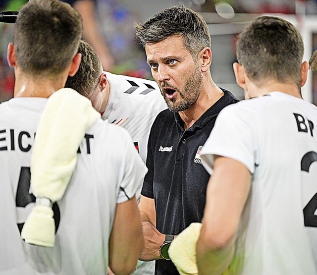 Coach Michal Winiarski (Mitte)  | Foto: JURE MAKOVEC (AFP)