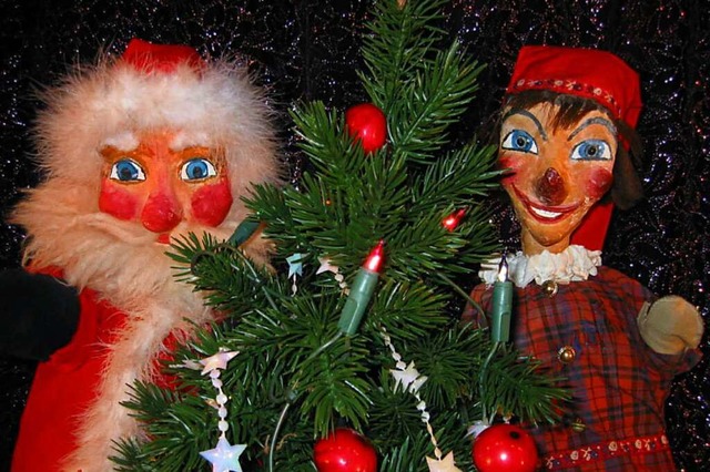 Der Weihnachtsmann und Kasper haben Aufregung.  | Foto: Freiburger Puppenbhne