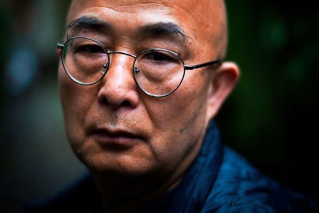 Liao Yiwu landete wegen eines Textes i...iedenspreis des deutschen Buchhandels.  | Foto: LIONEL BONAVENTURE (AFP)