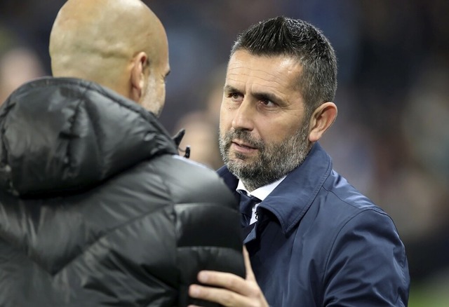 Pep Guardiola (li.), Trainer von Manch...2019 nach einem Champions-League-Spiel  | Foto: Nick Potts (dpa)