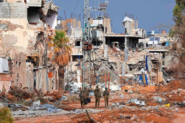Die Bilder der Bombenruinen werden von...eben zur Hlle machen, sondern Israel.  | Foto: MAHMUD HAMS (AFP)