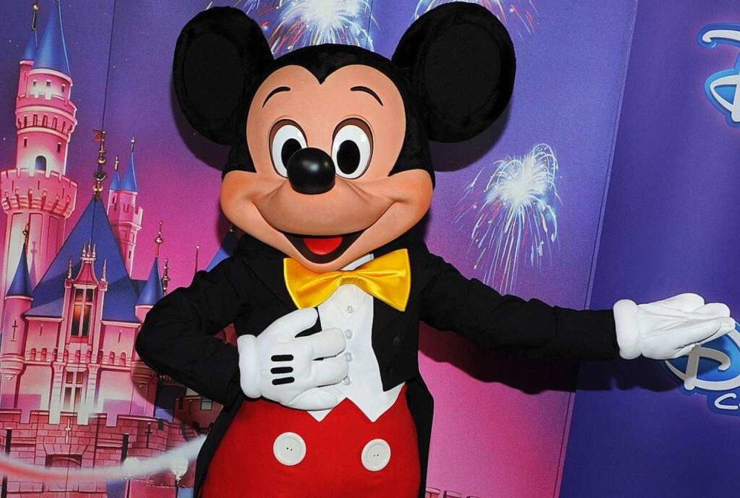 Micky Maus bei einer Feier des Disney ...ste Figur des Amerikaners Walt Disney.  | Foto: Ursula Düren (dpa)