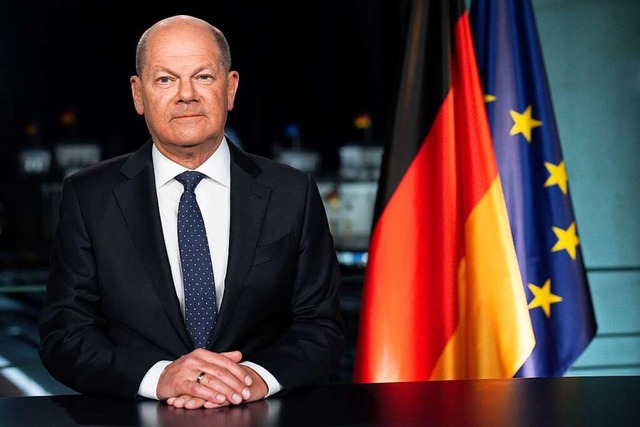 Bundeskanzler Olaf Scholz zeigt sich in seiner Neujahrsansprache optimistisch.  | Foto: Markus Schreiber (dpa)