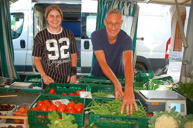 Frank Hler und Fabienne Rietschle hinter dem Stand des Rttehofs  | Foto: Petra Wunderle