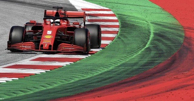 Ein Ex-Weltmeister im roten Flitzer: Sebastian Vettel im Ferrari 2020  | Foto: JOE KLAMAR (AFP)
