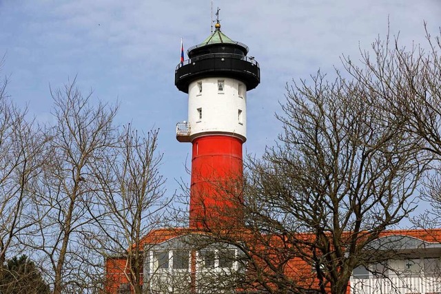 Der Alte Leuchtturm ist ein Wahrzeichen auf der Insel Wangerooge.  | Foto: Mohssen Assanimoghaddam (dpa)