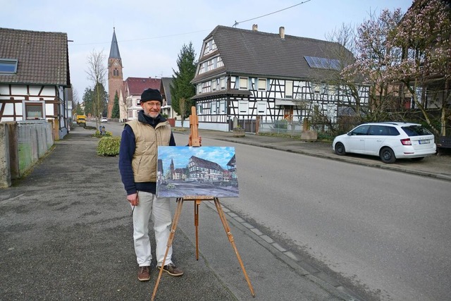 Steffen Schlager malt in der Nonnenweierer Hauptstrae.  | Foto: Ulrike Derndinger