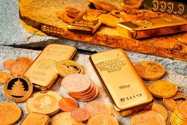 Goldbarren und -taler (Symbolbild)  | Foto: Reisebank AG (dpa)