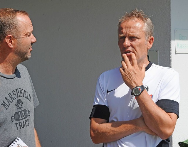 BZ-Sportchef Ren Kbler und SC-Trainer Christian Streich 2015.  | Foto: Meinrad Schn