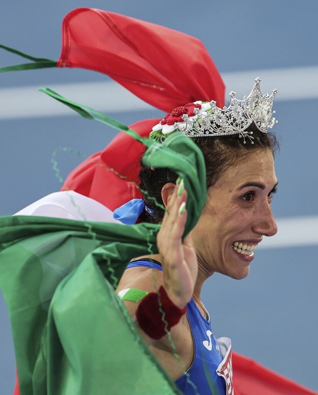 Die italienische Geherin Antonella Pal... das erste Gold der Leichtathletik-EM.  | Foto: Oliver Weiken (dpa)