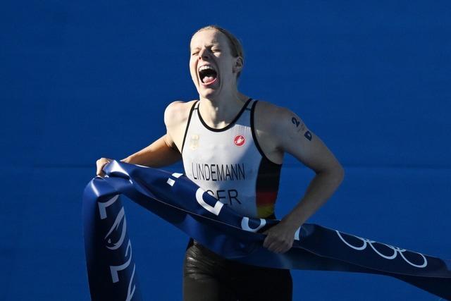 Lindemann und Rendschmidt tragen deutsche Fahne bei Schlussfeier der Olympischen Spiele