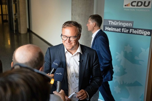 Mario Voigt,  Vorsitzender der CDU in ...essestatement vor den Fraktionsrumen.  | Foto: Hannes P Albert (dpa)