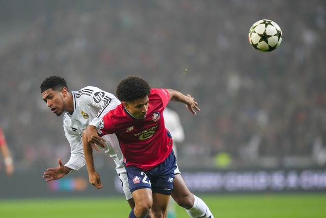 Real Madrid und Jude Bellingham patzten &uuml;berraschend beim OSC Lille.  | Foto: Thibault Camus/AP/dpa