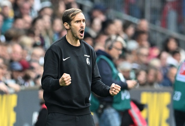 Julian Schuster jubelt nach dem Sieg in Bremen.  | Foto: Carmen Jaspersen (dpa)