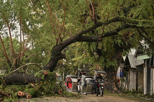 "Man-Yi", der auf den Philippinen "Pep...s, der &uuml;ber den Inselstaat zieht.  | Foto: Noel Celis/AP