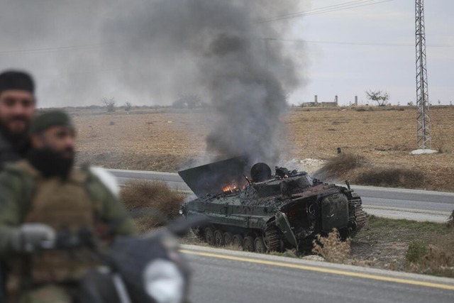 Die Rebellen erklren, Damaskus von Assad befreit zu haben.  | Foto: Ghaith Alsayed (dpa)