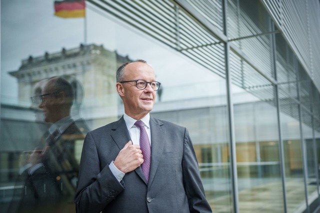 "Die B&uuml;rger wollen, dass das Land...ig regiert wird", sagt Friedrich Merz.  | Foto: Michael Kappeler/dpa