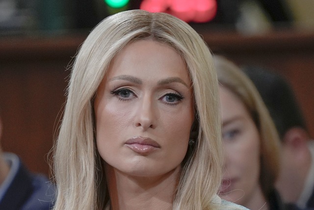 Realitystar Paris Hilton musste im Fer...s Angeles zum Opfer fiel. (Archivbild)  | Foto: Mariam Zuhaib/AP