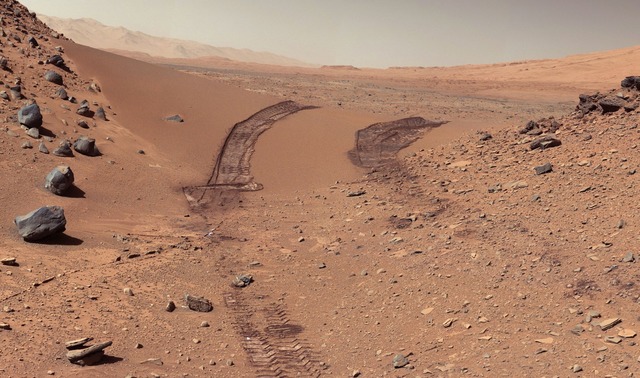 Roter Marsboden mit Spuren des Marsrovers "Opportunity" (Archivbild)  | Foto: Nasa/Jpl-Caltech/Msss/Press Association Images/dpa