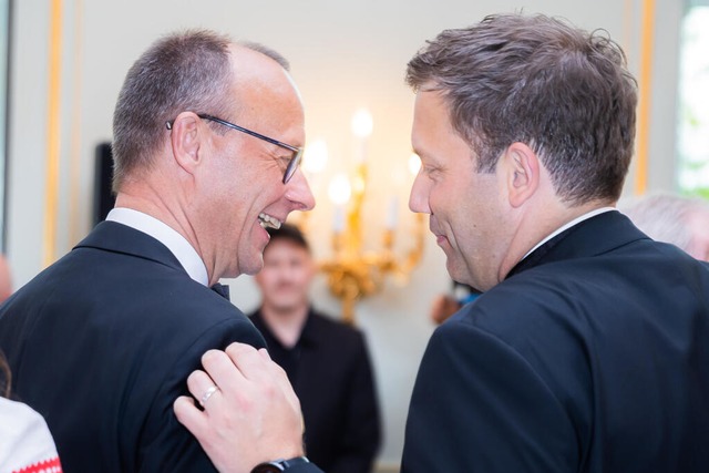 Friedrich Merz und Lars Klingbeil sondieren mit ihren Parteien. (Archivbild)  | Foto: Christoph Soeder (dpa)