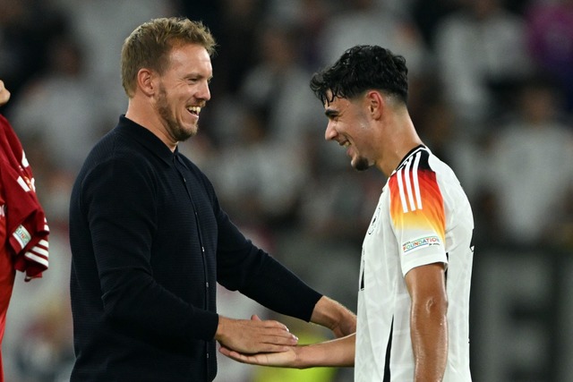 Julian Nagelsmann (l) und Aleksandar P...ndestrainer in der Nationalmannschaft.  | Foto: Federico Gambarini/dpa