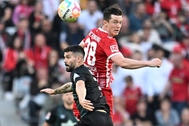 Anthony Jung hat mit dem SC Freiburg s...weikampf mit Michael Gregoritsch 2022. | Foto: Achim Keller Anthony Jung hat mit dem SC Freiburg s...weikampf mit Michael Gregoritsch 2022. | Foto: Achim Keller