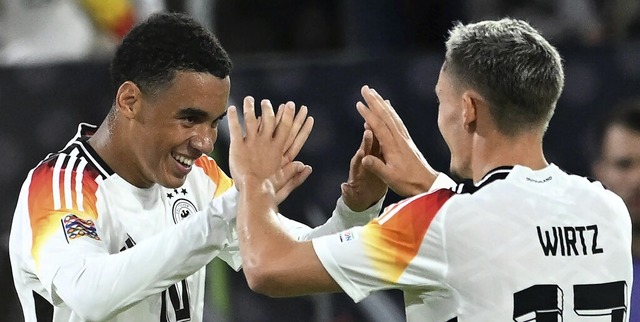 Jamal Musiala (links) jubelt mit Deuts...-Spiel gegen Ungarn im September 2024. | Foto: Fabian Strauch (dpa) Jamal Musiala (links) jubelt mit Deuts...-Spiel gegen Ungarn im September 2024. | Foto: Fabian Strauch (dpa)