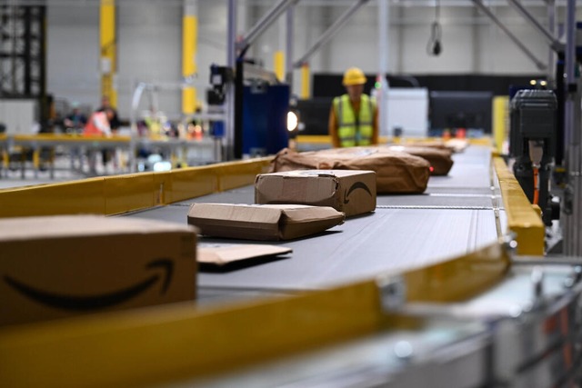 Paketsortierung bei Amazon  | Foto: Wolf von Dewitz (dpa)