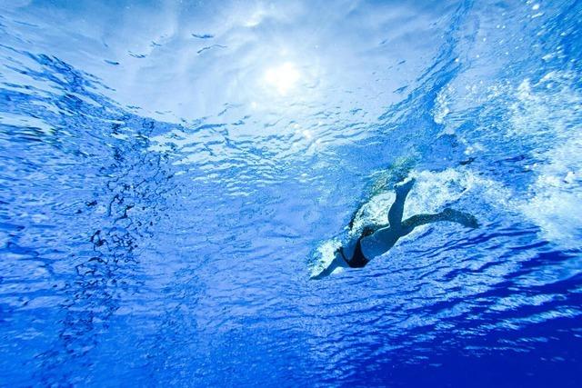 Nervt die echte Welt? Warum manche Menschen selbst beim Schwimmen Kopfhrer tragen wollen