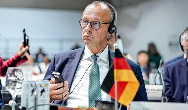 Die Wirtschaft als Lösung: Friedrich M... als Kernelement des Klimaschutzes an. | Foto: Kay Nietfeld/dpa Die Wirtschaft als Lösung: Friedrich M... als Kernelement des Klimaschutzes an. | Foto: Kay Nietfeld/dpa