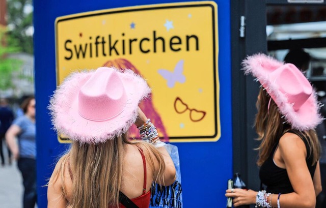 Eine Stadt im Swift-Fieber: Community-Bildung ber das gemeinsame Idol.  | Foto: Oliver Berg/dpa
