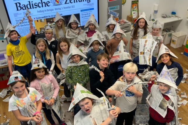 Frieden, Football, Hundefrisr - Zisch-Kinder schreiben ber Themen, die sie bewegen