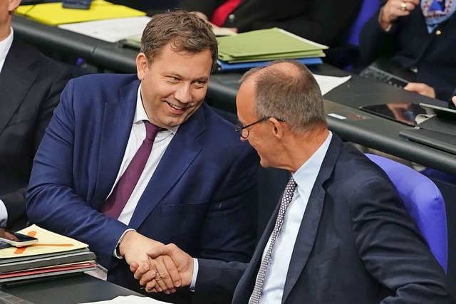 Lars Klingbeil und Friedrich Merz  | Foto: Kay Nietfeld (dpa)