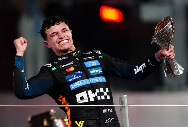 Am Ziel seiner Tr&auml;ume: Der neue Formel-1-Weltmeister Lando Norris.  | Foto: David Davies/PA Wire/dpa