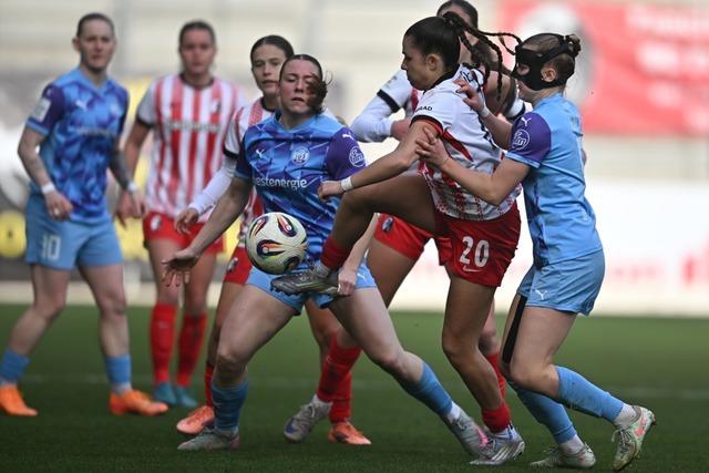 SC-Freiburg-Fuballerinnen rennen vergeblich an gegen die Abwehr der SGS Essen