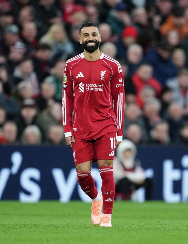 Hat wieder gut lachen: Mohamed Salah  | Foto: Martin Rickett/PA Wire/dpa