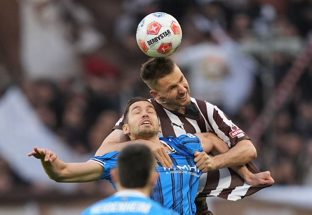 Marvin Pieringer verliert zwar das Kop...uli), war aber der beste Heidenheimer.  | Foto: Marcus Brandt/dpa