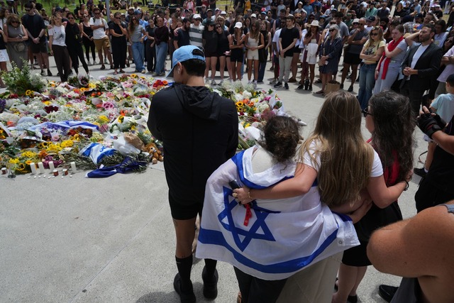 In Australien herrscht am Tag nach dem verheerenden Anschlag tiefer Schock.  | Foto: Mark Baker/AAP/dpa